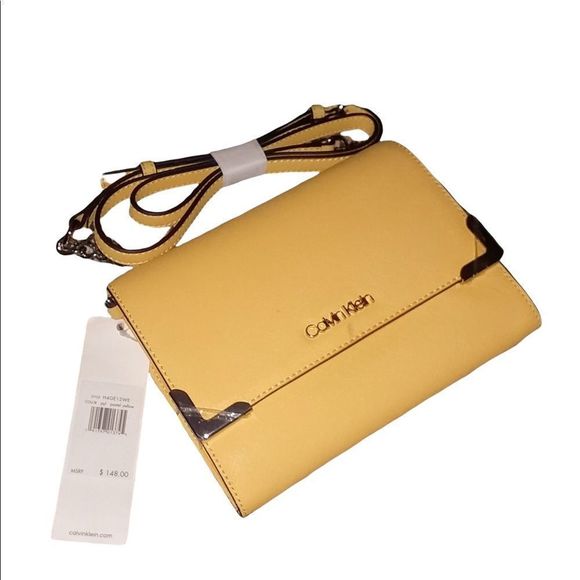 Calvin Klein Handbags - Calvin Klein Leather Crossbody in Yellow